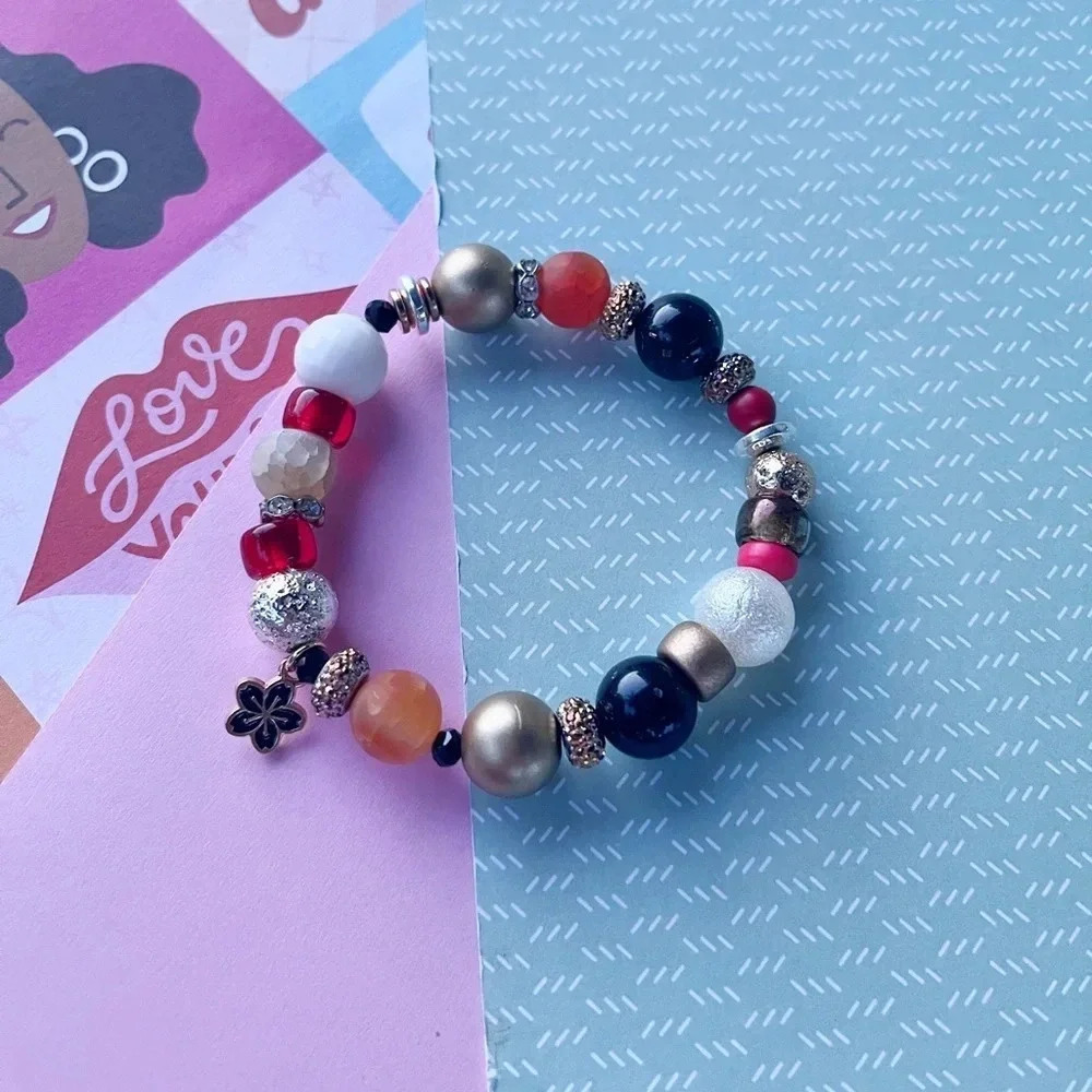 Handmade beaded statement bracelet with flower charm - Picture 2 of 4